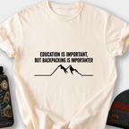 Education Is Important, But Backpacking Is Importanter T-Shirt — Ivory