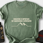 Education Is Important, But Backpacking Is Importanter T-Shirt — Moss