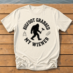 Bigfoot Grabbed My Wiener (Varsity) T-Shirt — Ivory