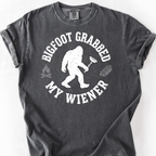 Bigfoot Grabbed My Wiener (Varsity) T-Shirt — Pepper
