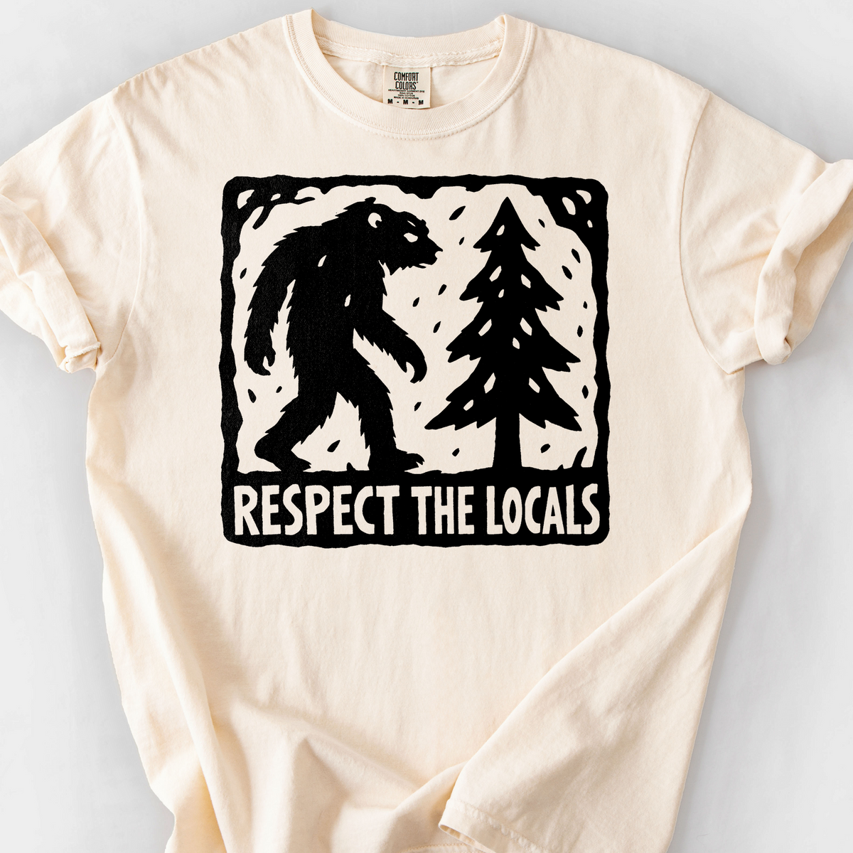 Bigfoot Respects The Locals T-Shirt — Ivory