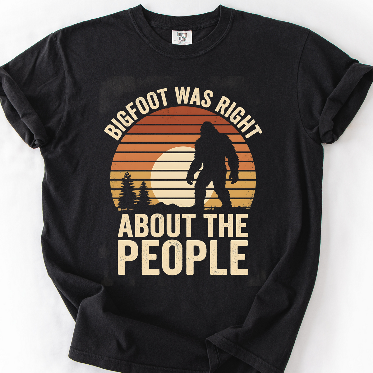 Bigfoot Was Right About the People (Sunset) T-Shirt — Black