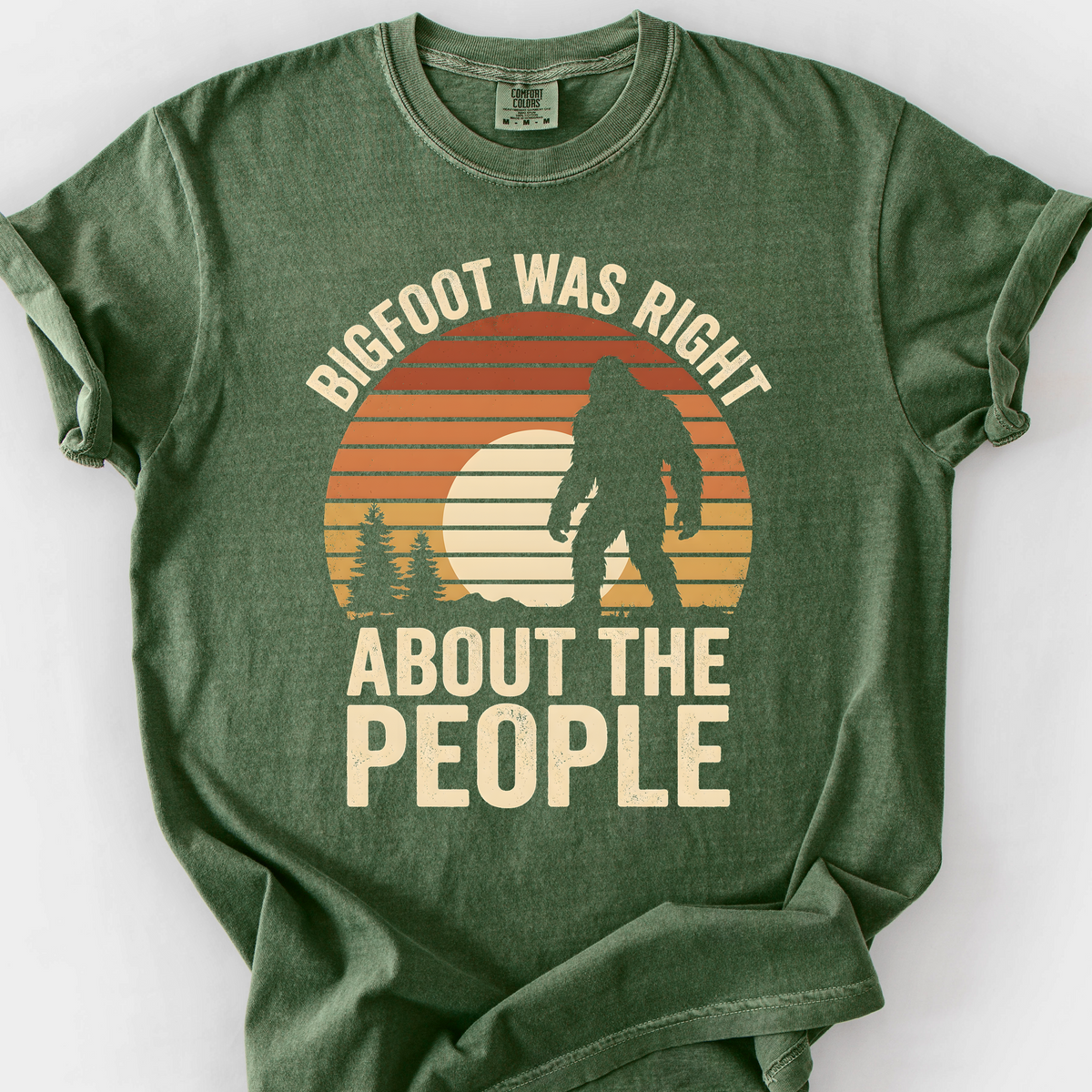 Bigfoot Was Right About the People (Sunset) T-Shirt — Moss