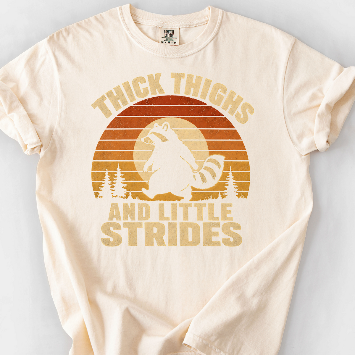 Thick Thighs and Little Strides (Raccoon) T-Shirt — Ivory