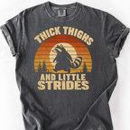 Thick Thighs and Little Strides (Raccoon) T-Shirt — Pepper